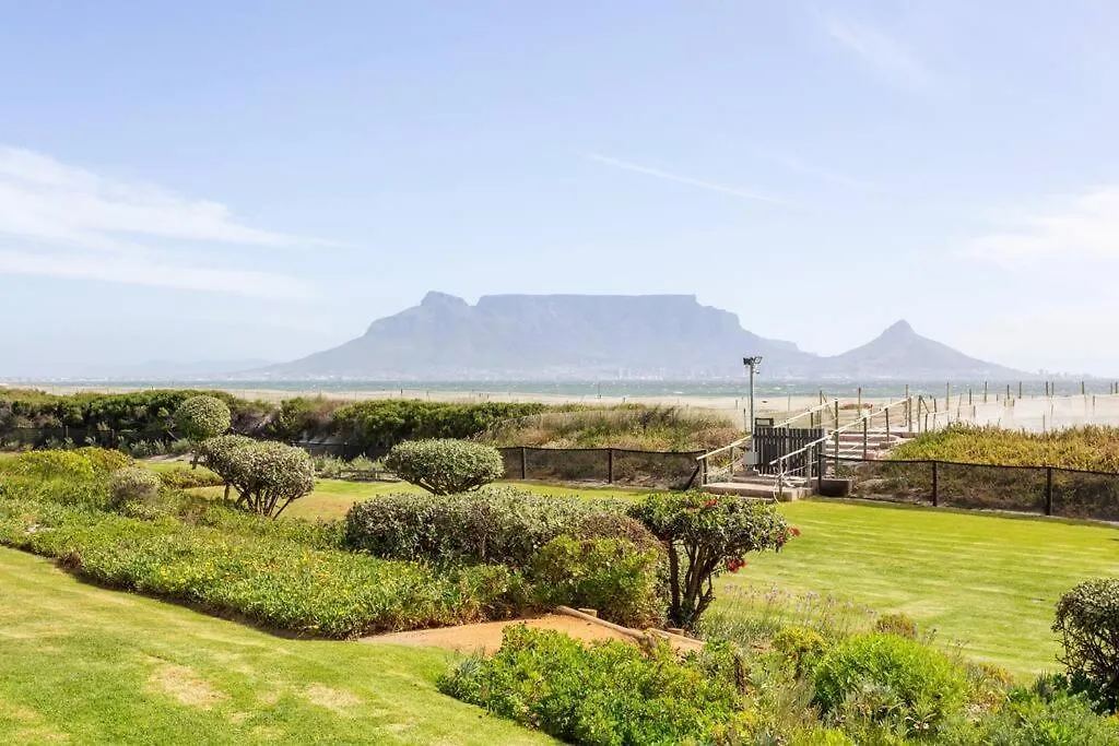 Apartment Dolphin Beach Cabana Luxe Beach Cabana Voor 4 Personen Direct Aan Het Strand Table View